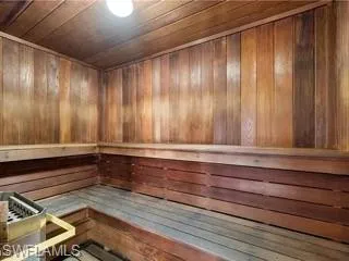 Relaxing sauna with wood ceiling and wood walls