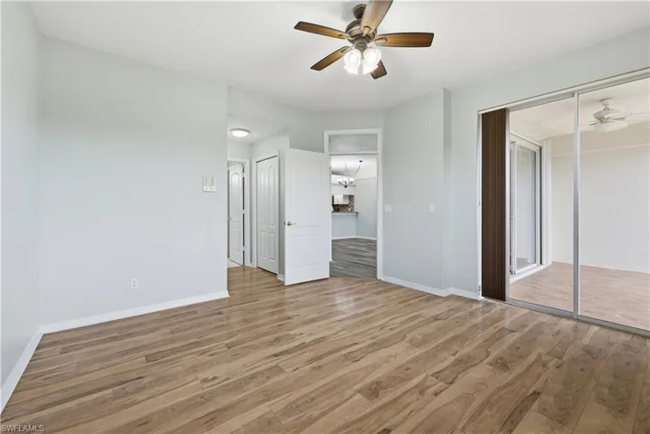 Unfurnished bedroom overlooking the lanai access to exterior