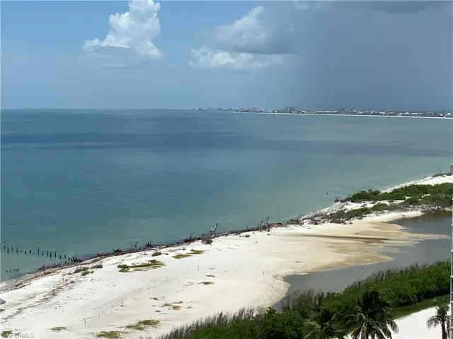 Beach view rain storm in distance