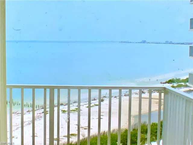 Beach view from balcony to north end of Island and Sanibel Island