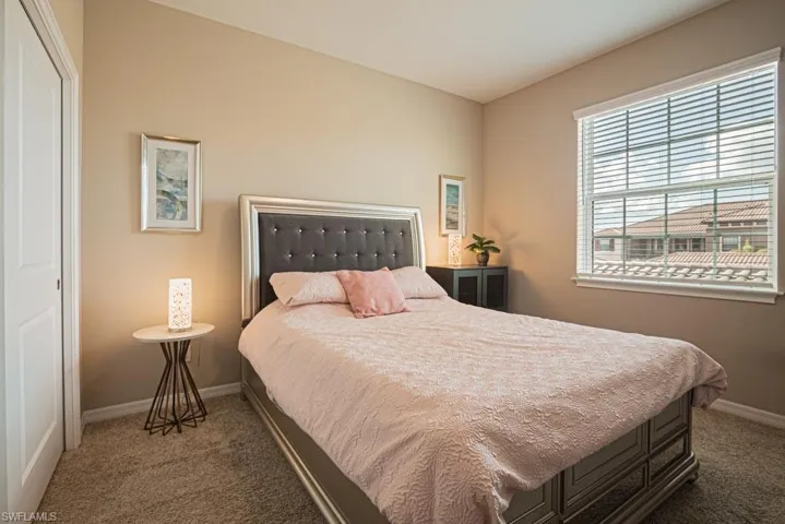 guest bedroom, split floorplan with pocket doors for added privacy