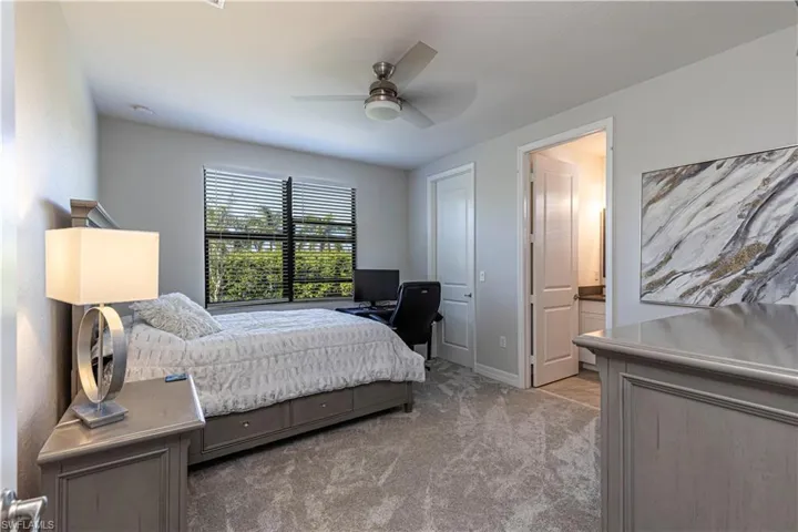 Guest bedroom in back of home with ensuite bath & walk in  closet