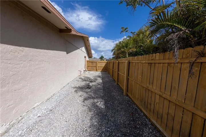 View of fenced backyard