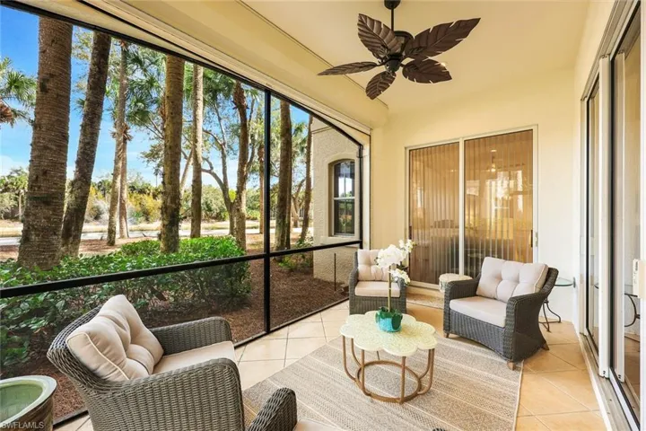 Sunroom / solarium featuring outdoor furniture and a ceiling fan