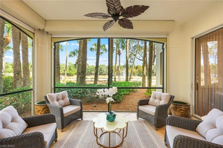 Sunroom with an outdoor hangout area and a ceiling fan