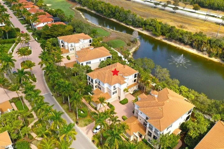 Aerial view of residential area with a large body of water