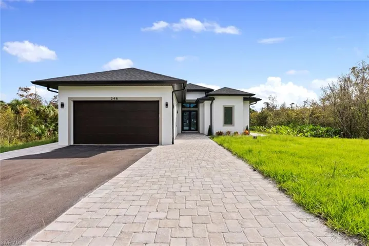 View of front facade with a garage