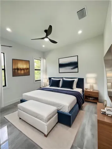Bedroom featuring light wood-type flooring and ceiling fan
