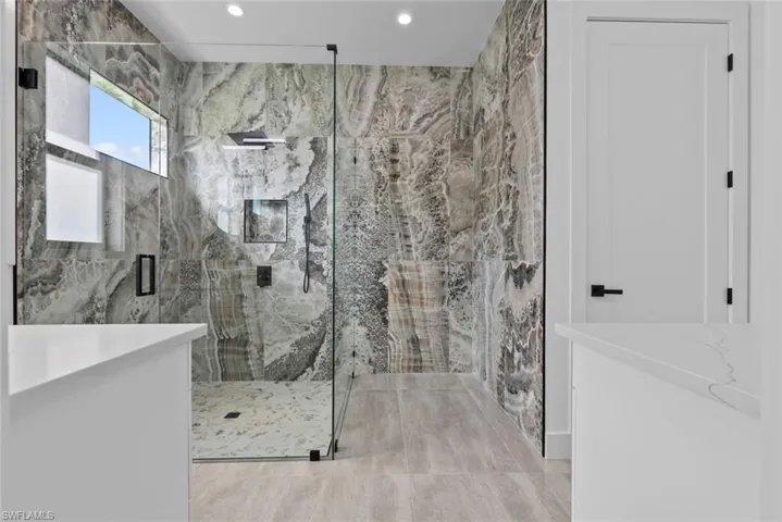 Bathroom featuring walk in shower