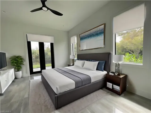 Bedroom featuring light hardwood / wood-style flooring and ceiling fan
