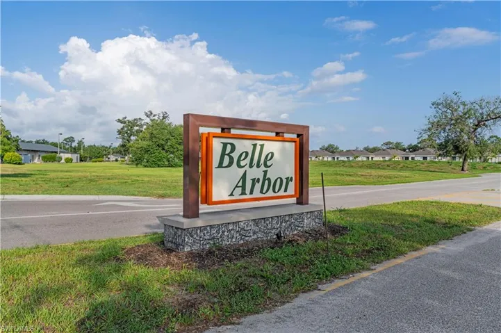 Community sign with a lawn