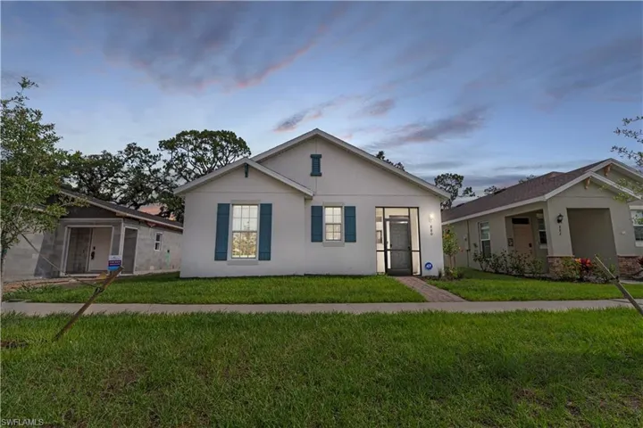 View of front of home featuring a yard