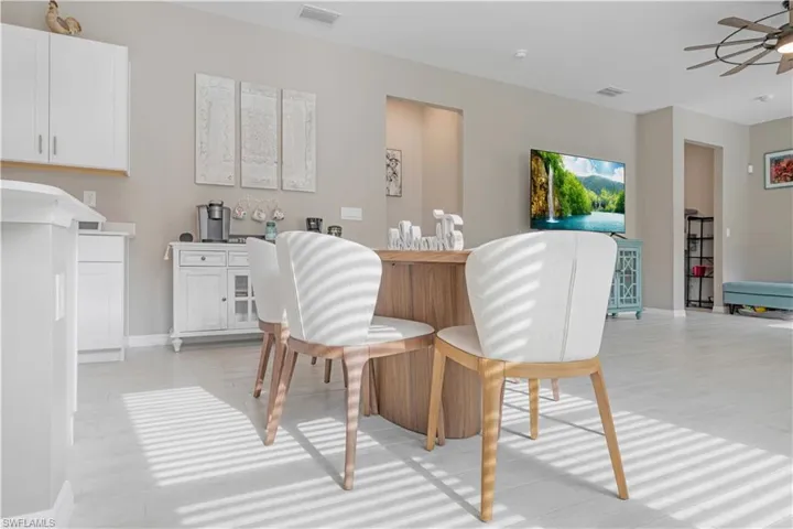 Dining space with ceiling fan