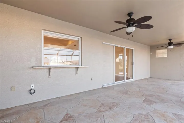View of patio / terrace with ceiling fan