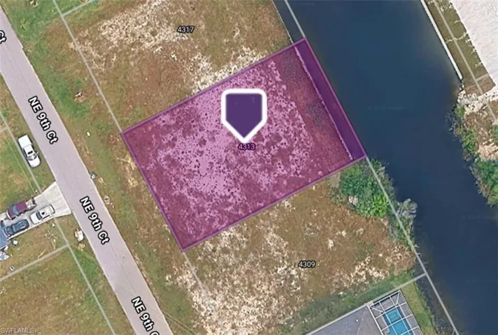 Lot with sea wall.