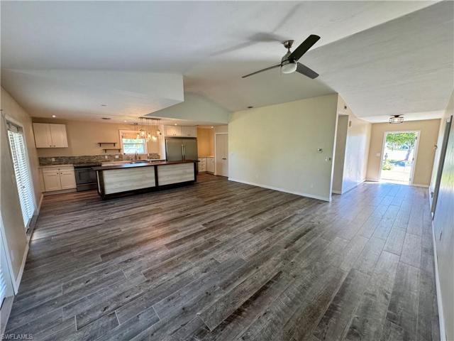 Wood Floors Throughout Living Areas & Bedrooms