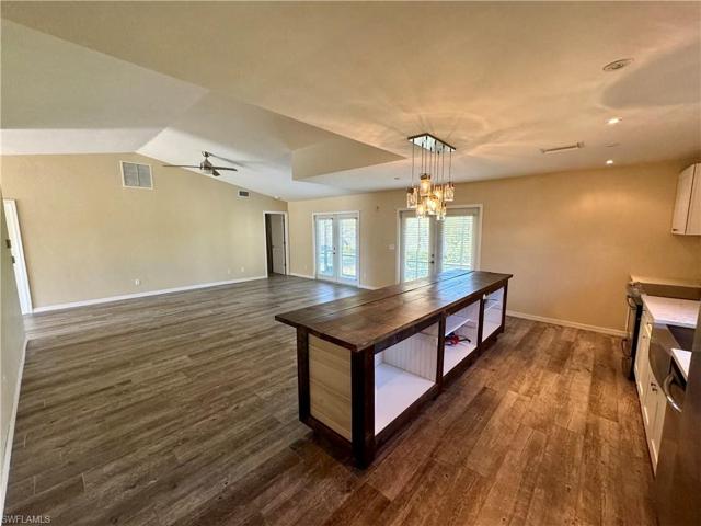 Two Sets of French Doors Lead to Back Lanai
