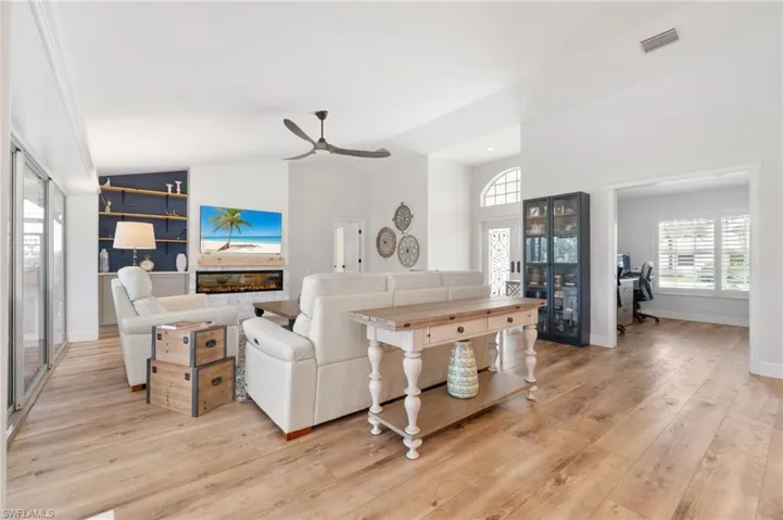 Light filled with wide plank flooring