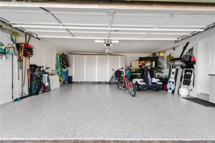 Large garage with epoxy floor, tons of storage and Stor-Wall