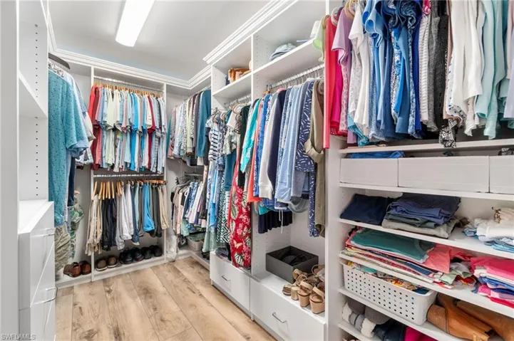 Custom designed walk in closet with built ins
