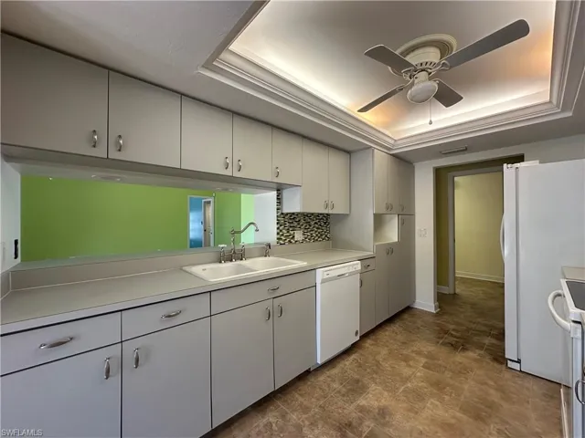 Galley Kitchen with View Into the Living Area/Breakfast Bar