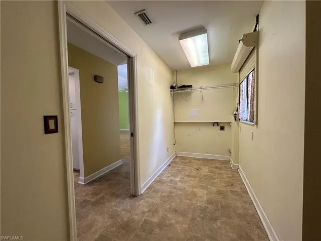 Inside Laundry Room w/ Washer & Dryer Hookups