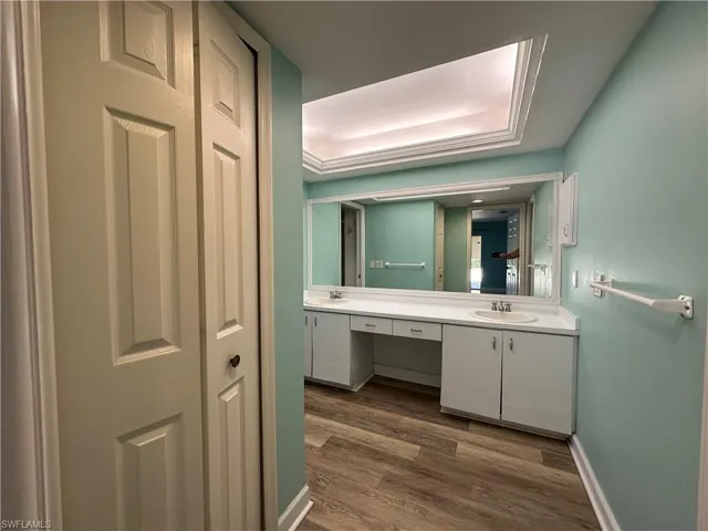 Master Bedroom has Shower and Dual Sinks with a Linen Closet