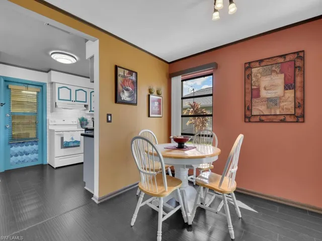 Dining area with crown molding