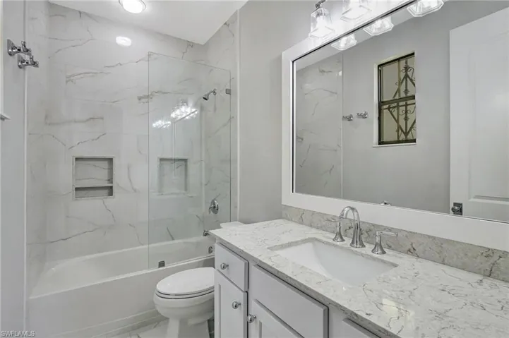 Remodeled Full bathroom off first floor second master bedroom  featuring shower / tub combination