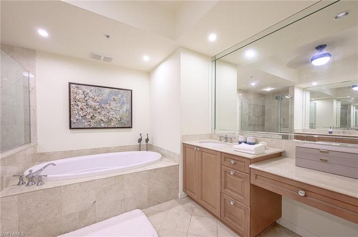 His and hers vanities with separate makeup vanity