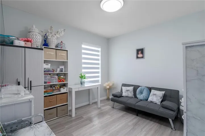 Office space featuring light wood-style flooring