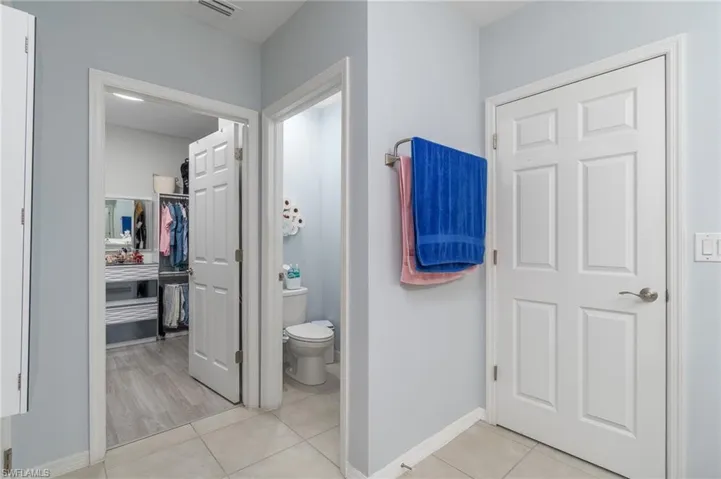 Bathroom featuring tile patterned floors and toilet