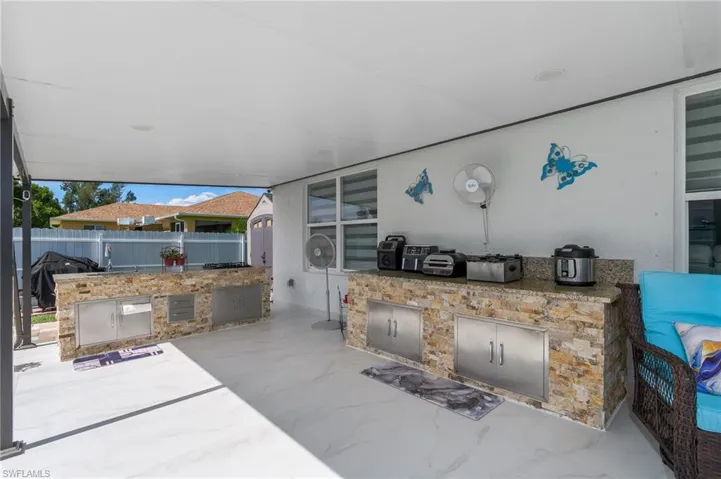 View of patio / terrace featuring an outdoor kitchen