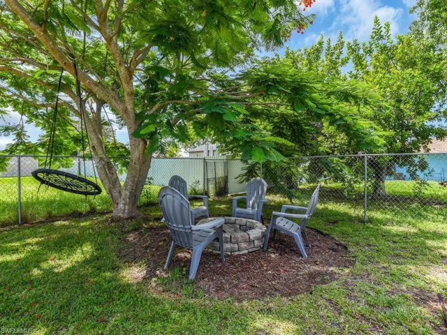 View of yard featuring a fire pit