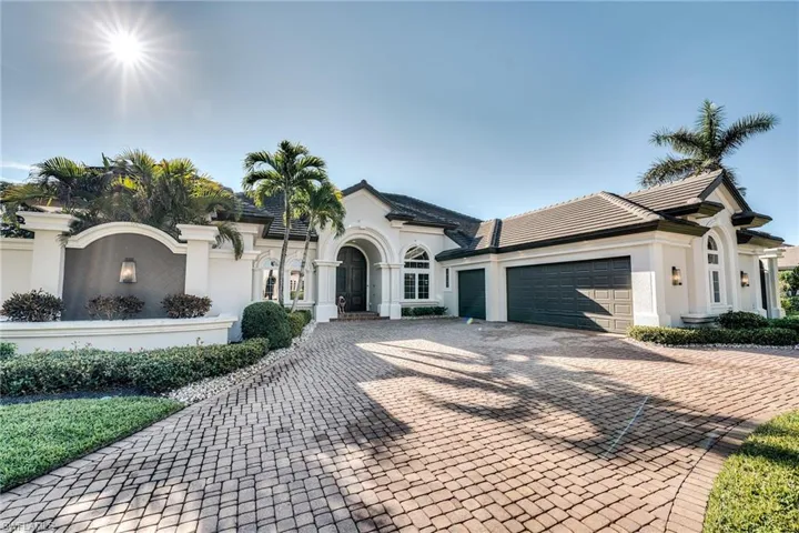 View of front of home featuring a garage