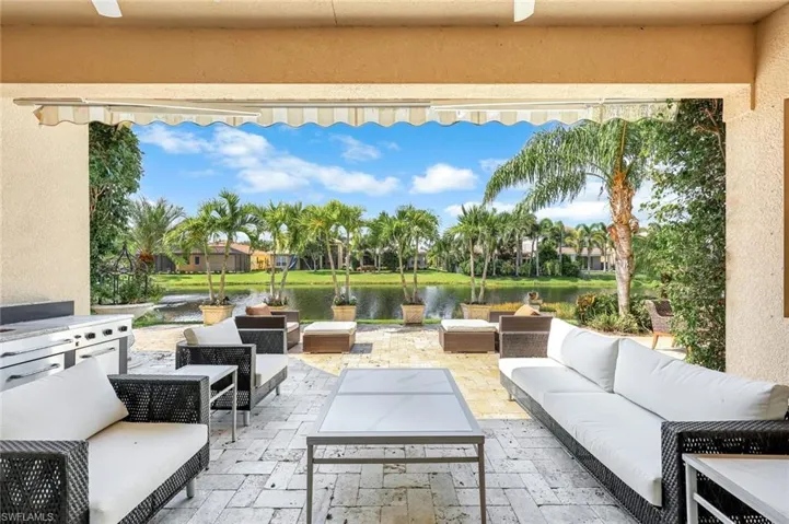 View of patio / terrace with an outdoor hangout area and a water view