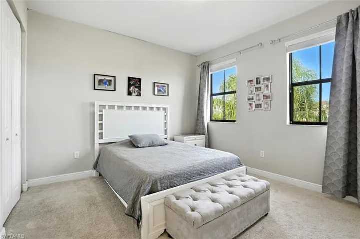 Bedroom featuring a closet and carpet