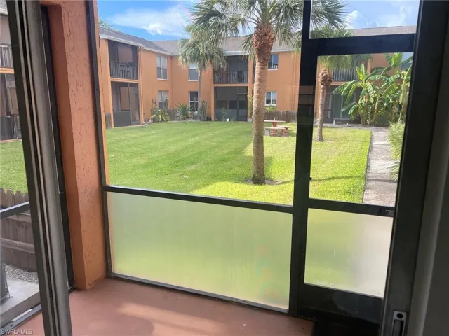 Lanai view with door to courtyard & pool