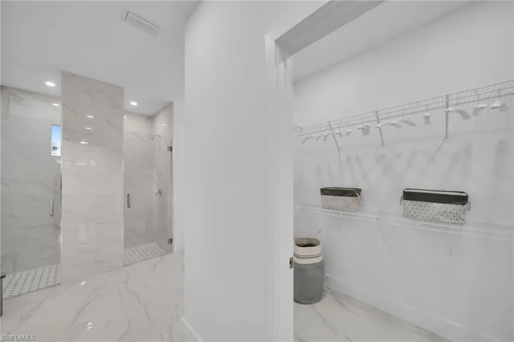Bathroom featuring walk in shower