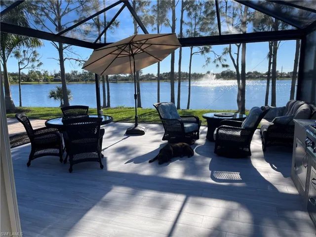 View of patio / terrace with an outdoor lounge area and a water view