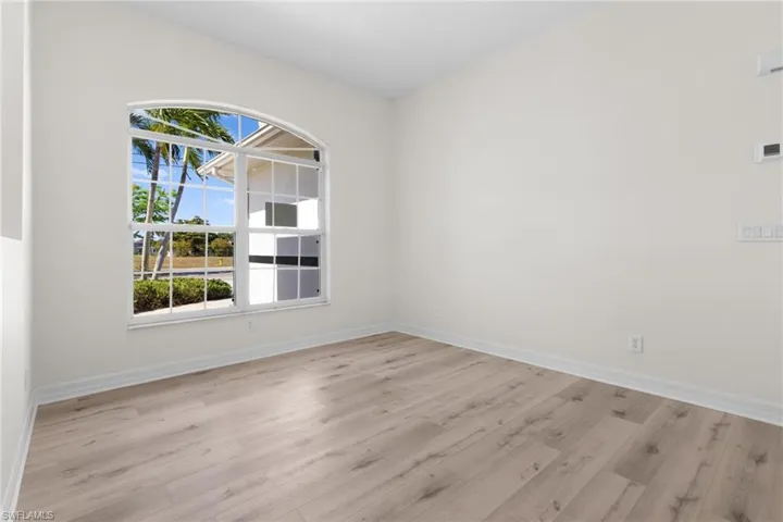 Spare room featuring light hardwood / wood-style floors