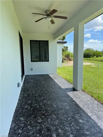 View of patio with ceiling fan