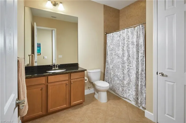 Large guest bath with tub/shower combination.