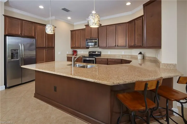 This spacious kitchen is where the family will gather to celebrate special times together.