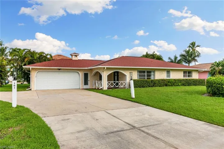 Corner lot with large circular driveway