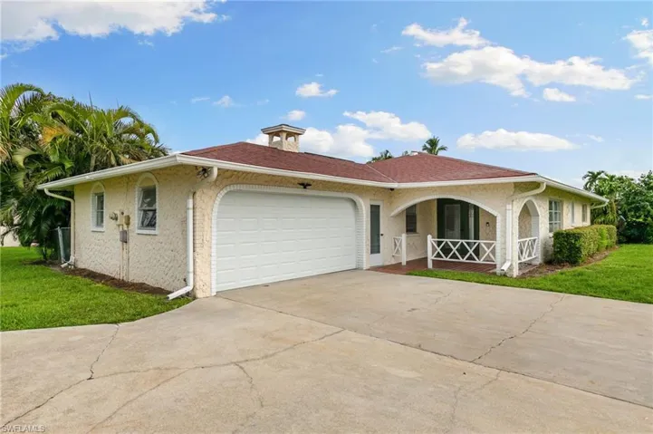 View of front with large circular driveway