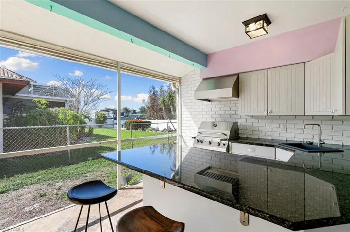 Screened lanai outdoor kitchen