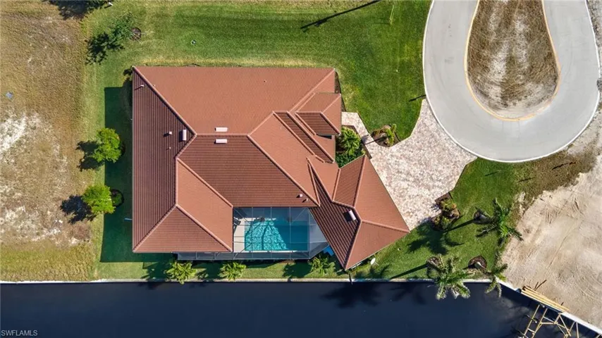 Drone / aerial view of home overlooking the canal