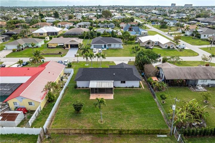 Fenced In Backyard with room to Build A Pool.