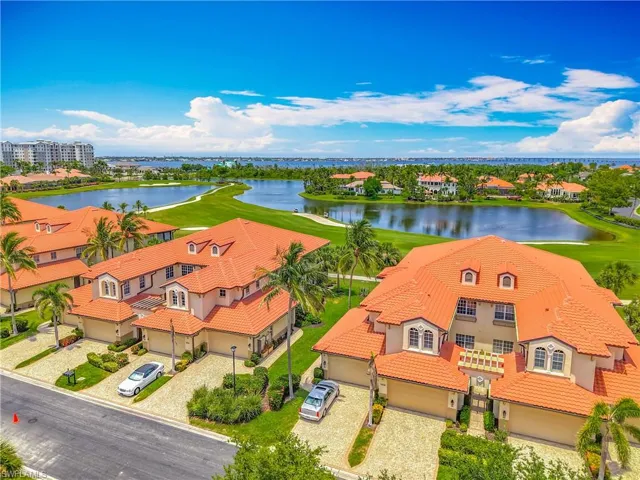 Drone / aerial view of a large body of water and a golf club
